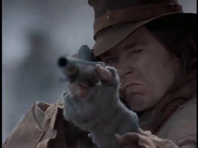 A militia man shoots Colonel Rall; the Hessians surrender; Rall is treated by Mercer.