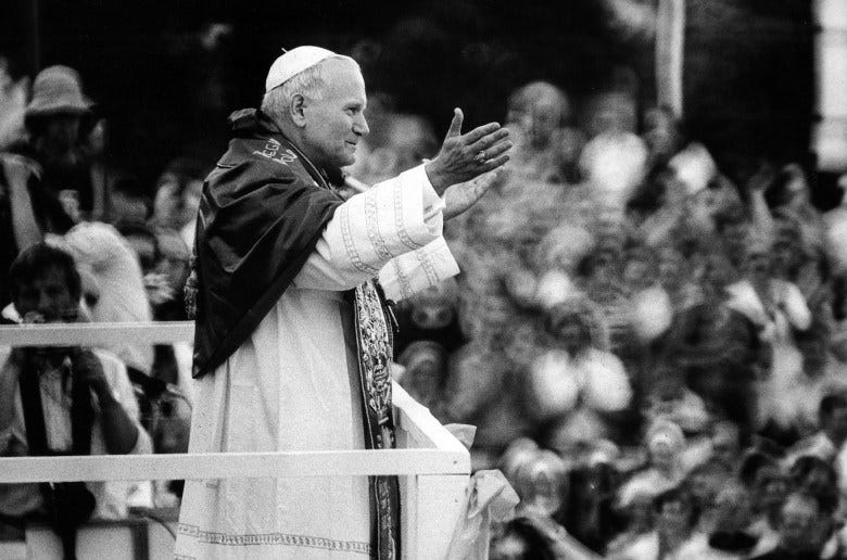 St. John Paul II greets throngs of Poles waiting for a glimpse of their native son at the monastery of Jasna Gora in Czestochowa during his 1979 trip to Poland.