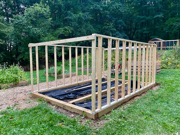 Mosaic of the beginning of building a greenhouse's walls.