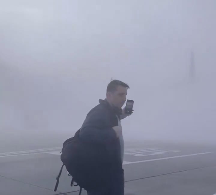 BREAKING: Passengers seen evacuating after American Airlines plane catches fire at Denver airport