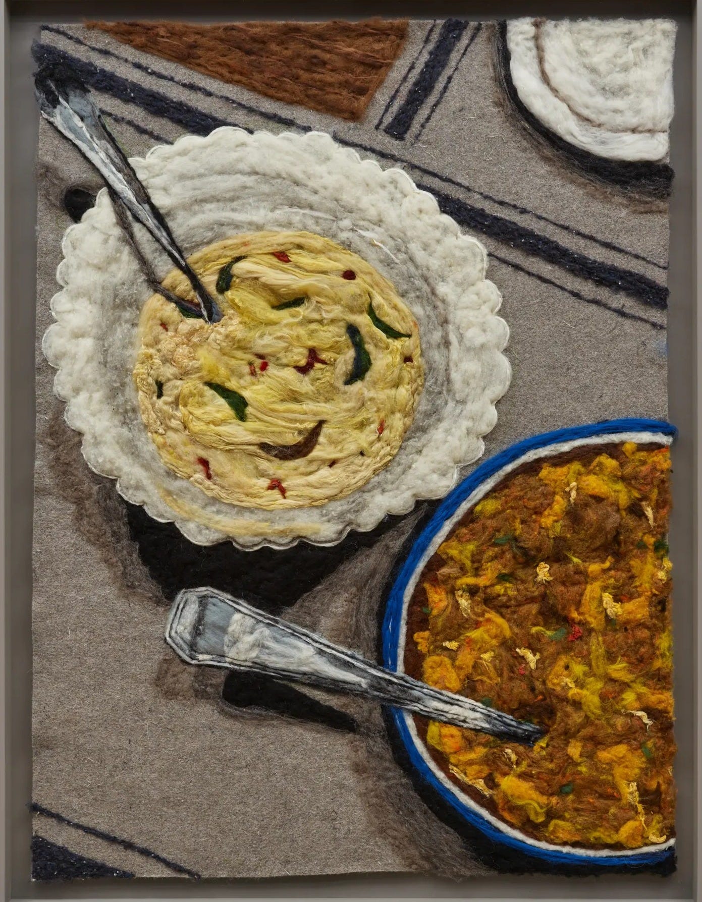 Melissa Joseph, Curry is a Casserole, 2026. Needle-felted wool image of a tray from above, holding a dish of curry and a dish of pasta with serving spoons.