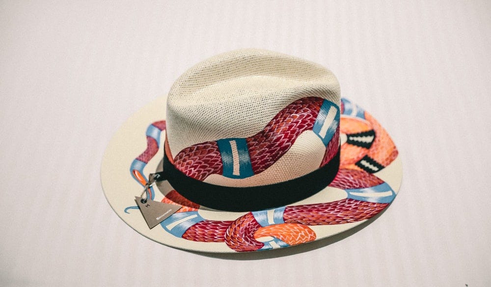 white and multicolored snake print fedora hat white and multicolored snake print fedora hat