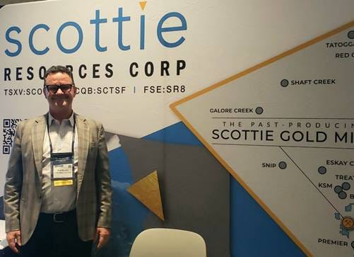 A person standing in front of a sign

AI-generated content may be incorrect.