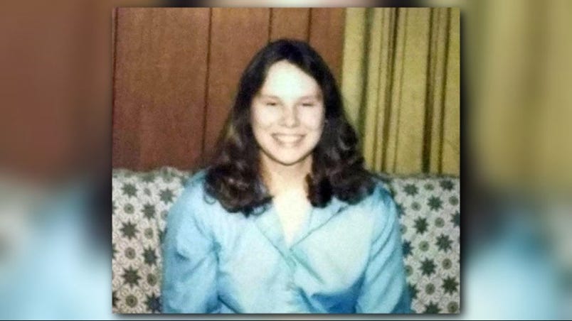 A person sitting on a couch

Description automatically generated with medium confidence