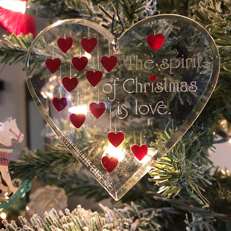 A collection of ornaments and quilted decorations in red, green and sparkling white.