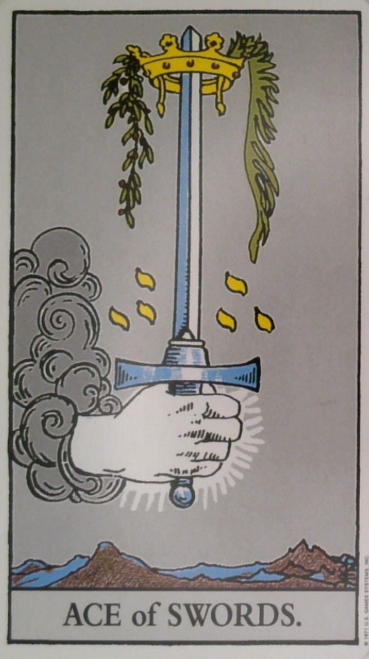 The Ace of Swords tarot card and the Lifting the Veil oracle card.