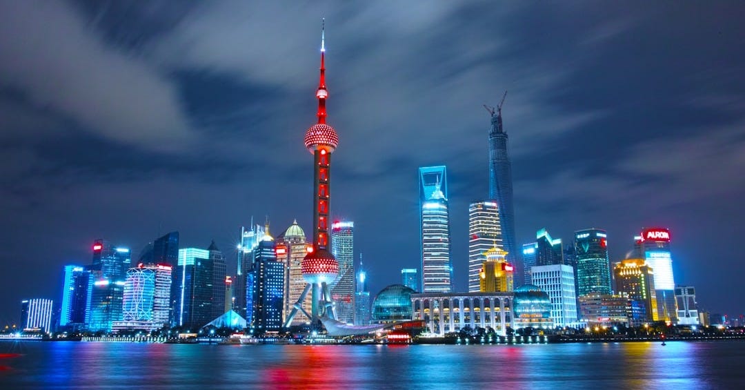 architectural photograph of lighted city sky architectural photograph of lighted city sky