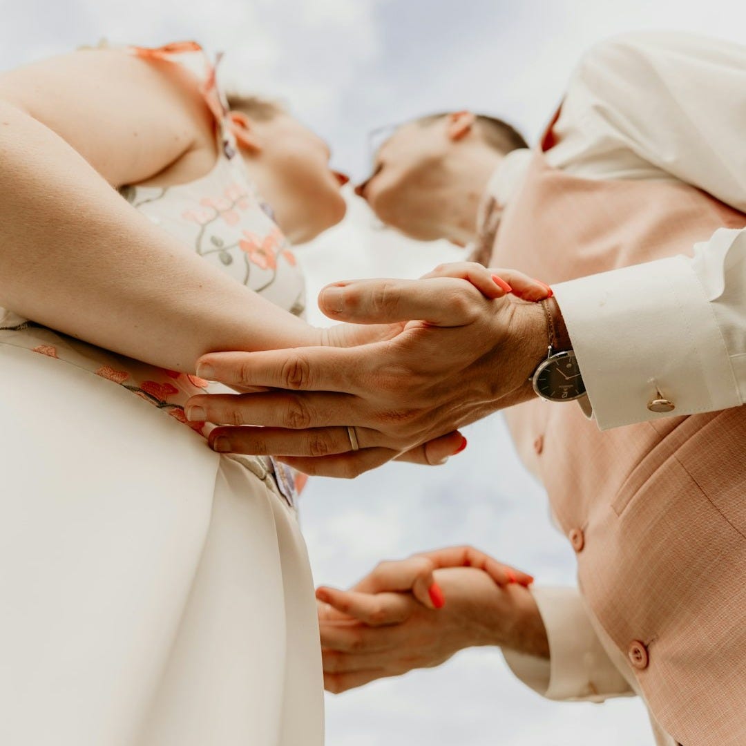 Couple sharing a tender moment on a wedding day