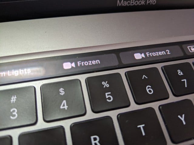 Touch bar showing Frozen movies Touch bar showing Frozen movies