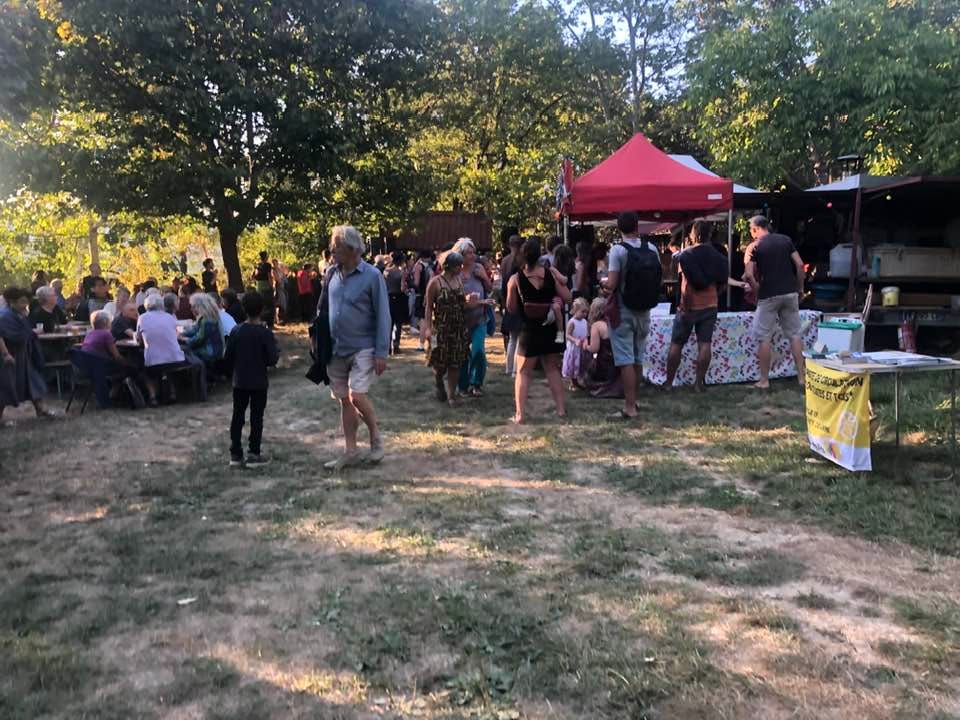 May be an image of 3 people and crowd