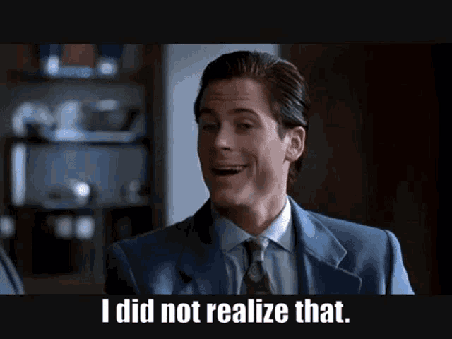 a man in a suit and tie is saying i did not realize that