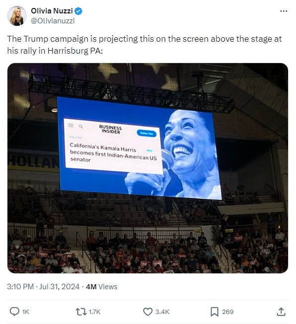 screenshot of a tweet showing a large screen in an arena displaying a photo of a Business Insider headline: 'California's Kamala Harris becomes first Indian-American US senator' screenshot of a tweet showing a large screen in an arena displaying a photo of a Business Insider headline: 'California's Kamala Harris becomes first Indian-American US senator'