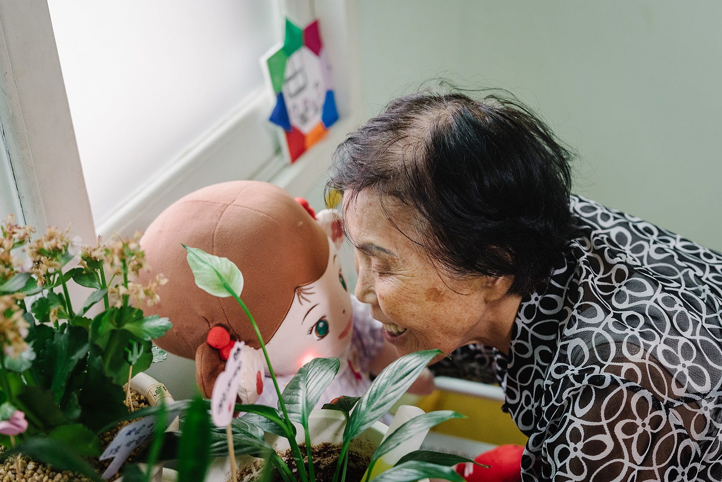 AI robot dolls charm their way into nursing the elderly