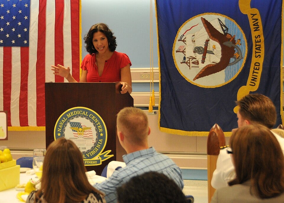 Actress Wendy Davis from "Army Wives" speaks in front of a crowd of people from the Naval Medical Center.
