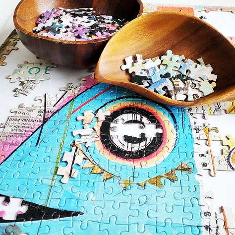 jigsaw puzzle pieces from various puzzles