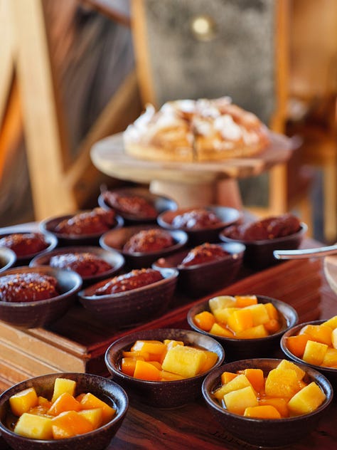 Place with a sample of a the different food options available during Sunday brunch at Too Restaurant. 