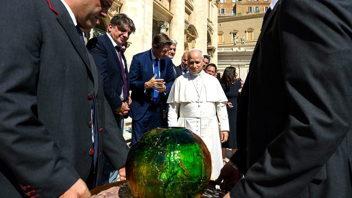 Pope Leo XIV receives 'symbolic’ sphere in charity's push for AI to  'protect human dignity'