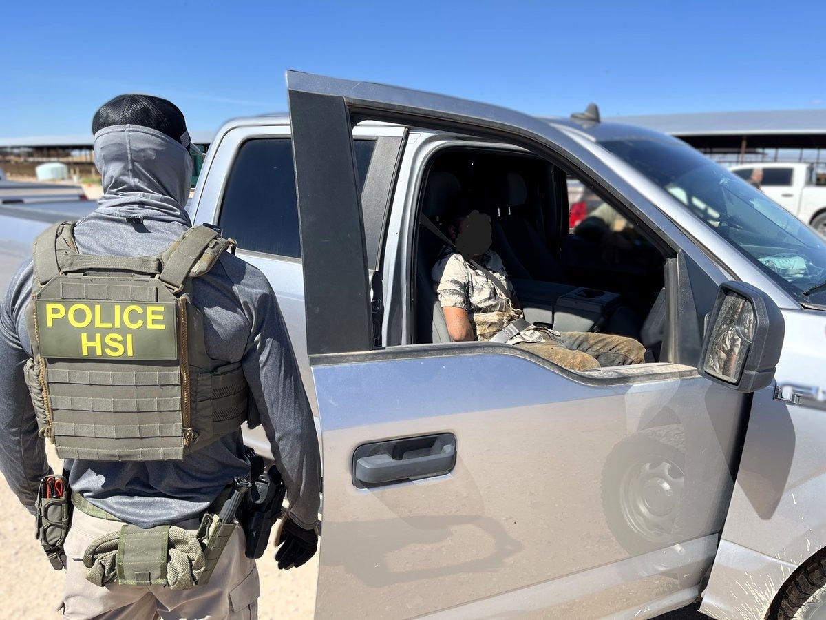 A Homeland Security Investigations (HSI) Agent detains a migrant worker on a New Mexico dairy farm. A Homeland Security Investigations (HSI) Agent detains a migrant worker on a New Mexico dairy farm.