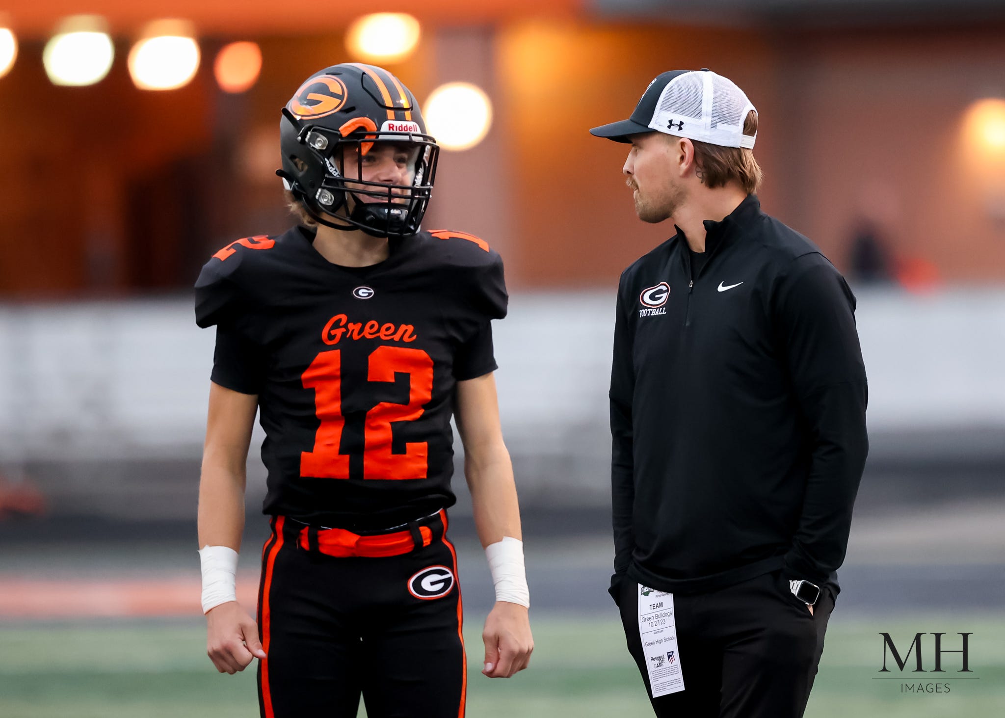 May be an image of 2 people, people playing football and text