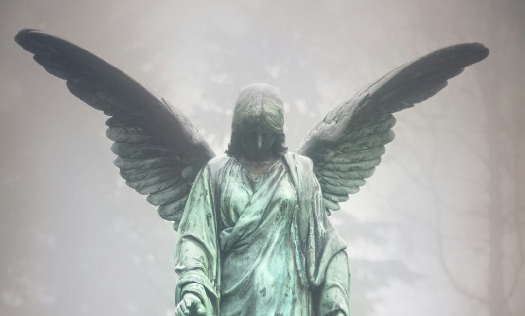 green female angel statue green female angel statue