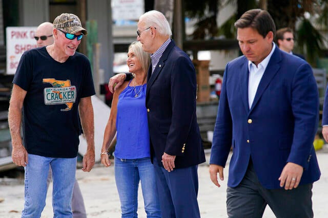 Joe Biden, Ron DeSantis join together in Ian recovery effort | TribLIVE.com