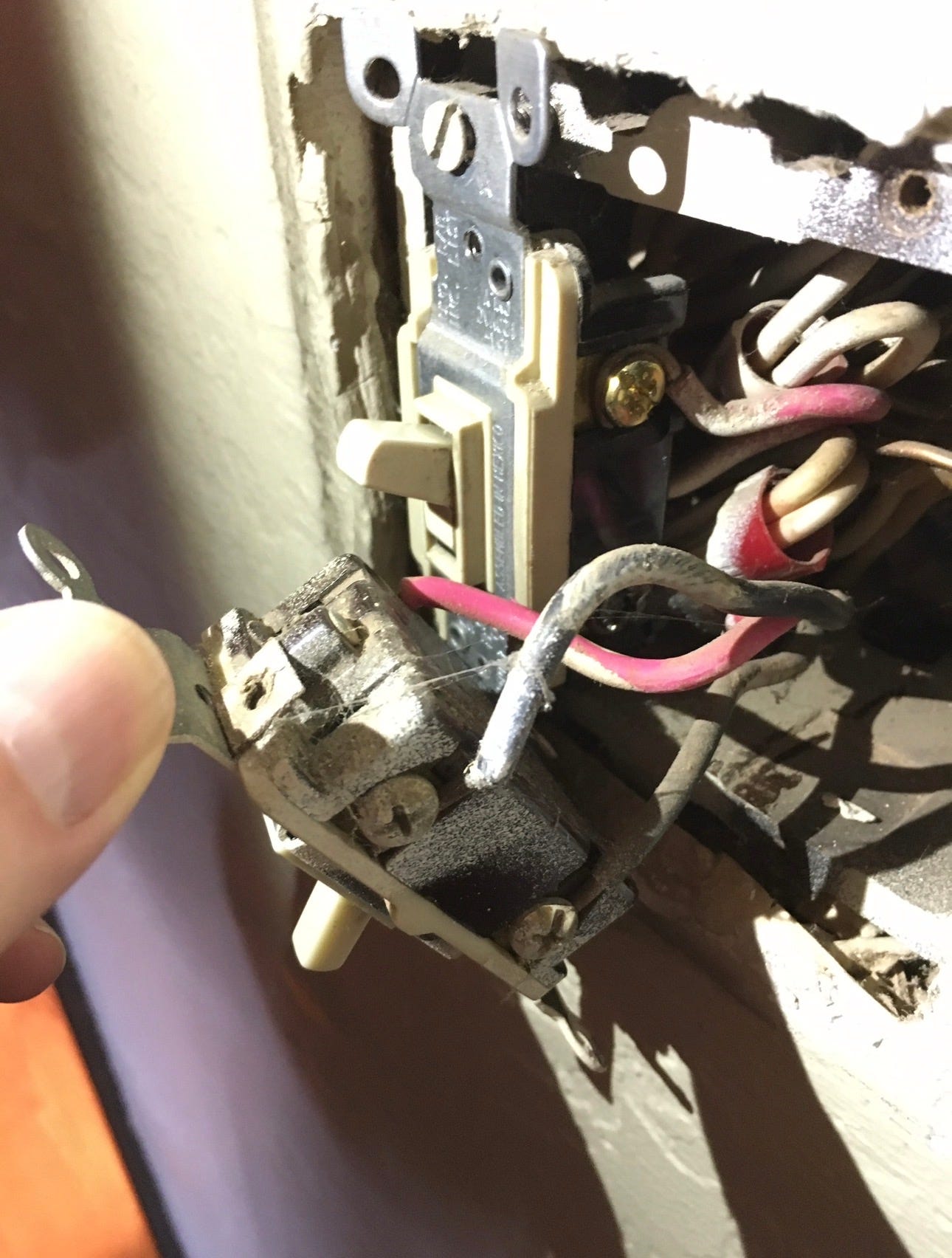 Working on a light switch Working on a light switch