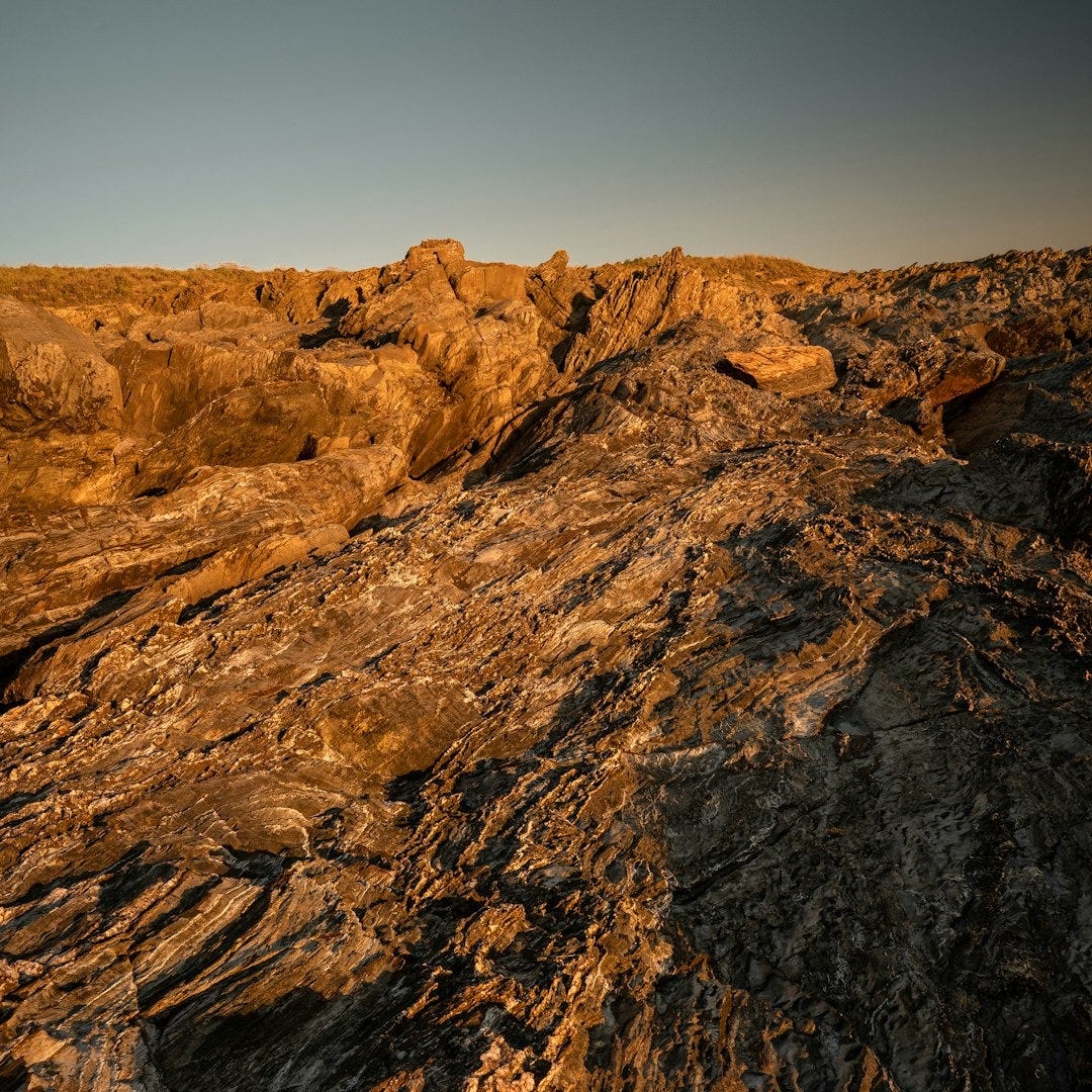 a rocky landscape with a few rocks on the ground