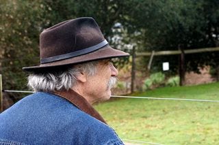 Man with hat and mustache Man with hat and mustache