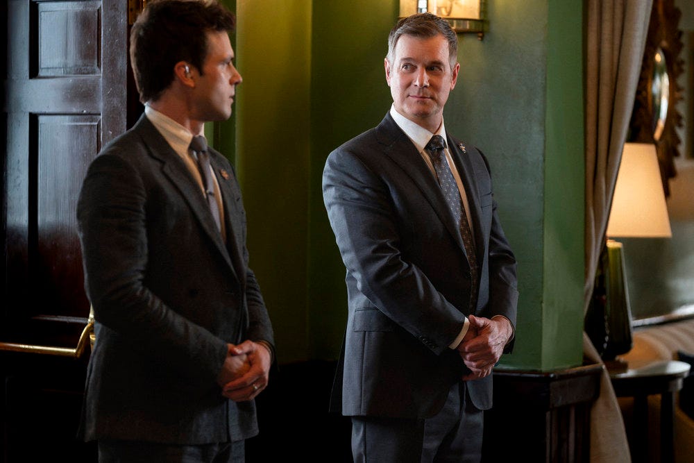 LINE OF FIRE -- "Cabin Pressure" Episode 106 -- Pictured: Micah and Mike waiting to speak with Barnes about the assassination in the White House office LINE OF FIRE -- "Cabin Pressure" Episode 106 -- Pictured: Micah and Mike waiting to speak with Barnes about the assassination in the White House office