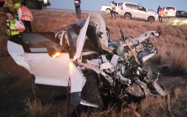 First responders at the scene of a car crash on Route 6 near Kiryat Gat on July 28, 2022. (Magen David Adom) First responders at the scene of a car crash on Route 6 near Kiryat Gat on July 28, 2022. (Magen David Adom)