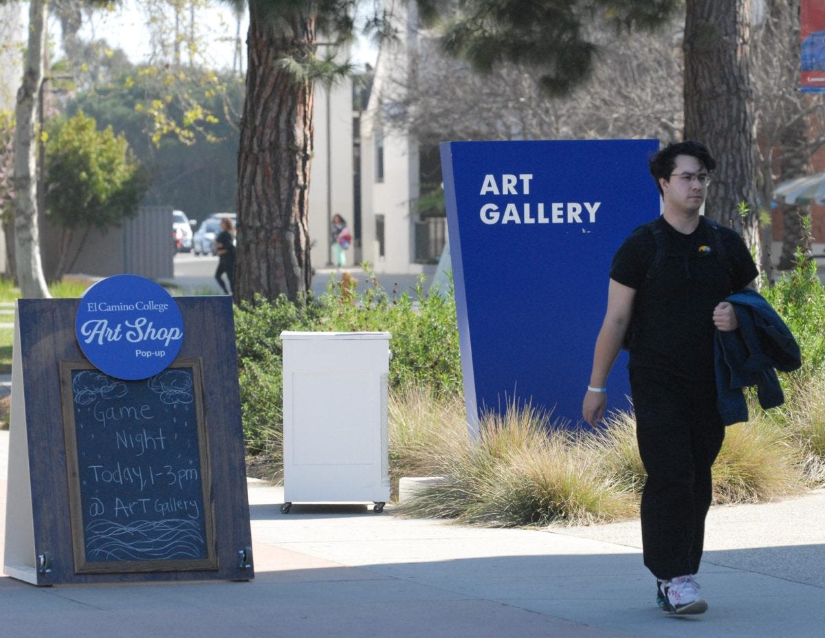 Communications major Curtis Lee Lovegren, 26, walks by the entrance of the Art Gallery on Wednesday, Feb. 26. Several walk-in art workshops and other free activities, including game night and karaoke, are available at the Art Gallery. (Osvin Suazo | The Union)