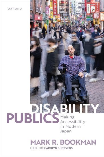 The cover is white with a large picture of a person using an electric wheelchair on a street, looking towards the camera, with people walking behind them as a blur. Text is white over the picture and lavender as it stretches into the white border of the cover. The cover is white with a large picture of a person using an electric wheelchair on a street, looking towards the camera, with people walking behind them as a blur. Text is white over the picture and lavender as it stretches into the white border of the cover.