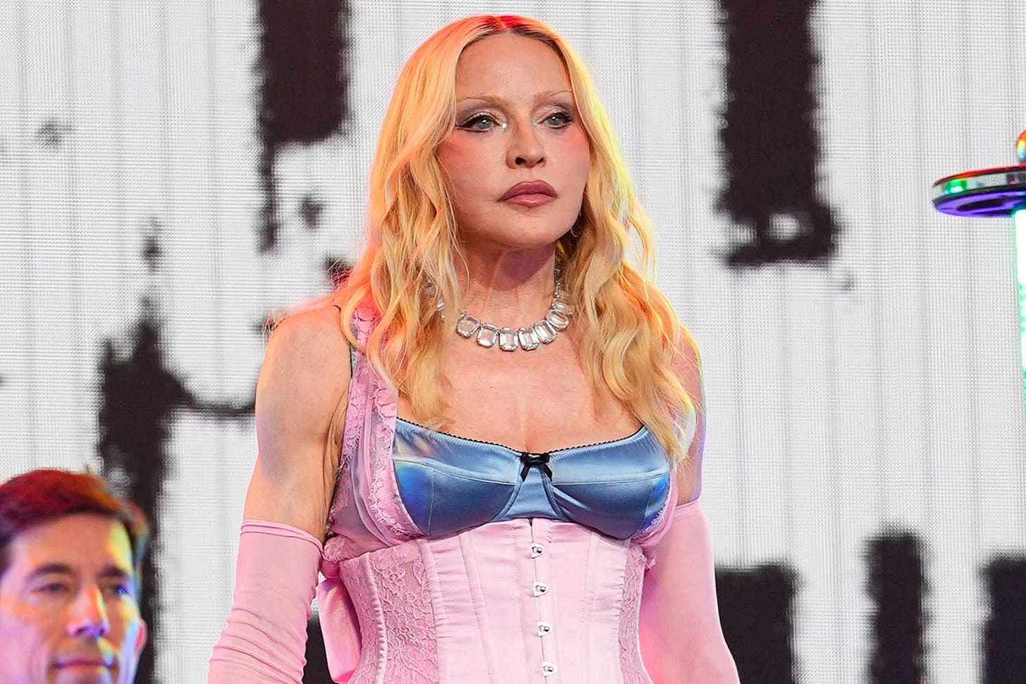 Madonna straddles barrier during Times Square concert Madonna straddles barrier during Times Square concert
