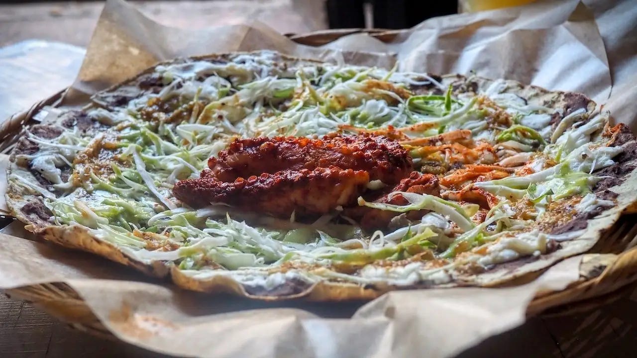 Tlayuda with grilled octopus