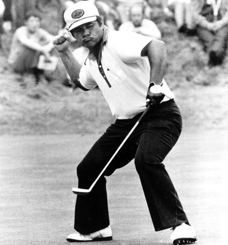 This may contain: a black and white photo of a man holding a tennis racket in his hand This may contain: a black and white photo of a man holding a tennis racket in his hand