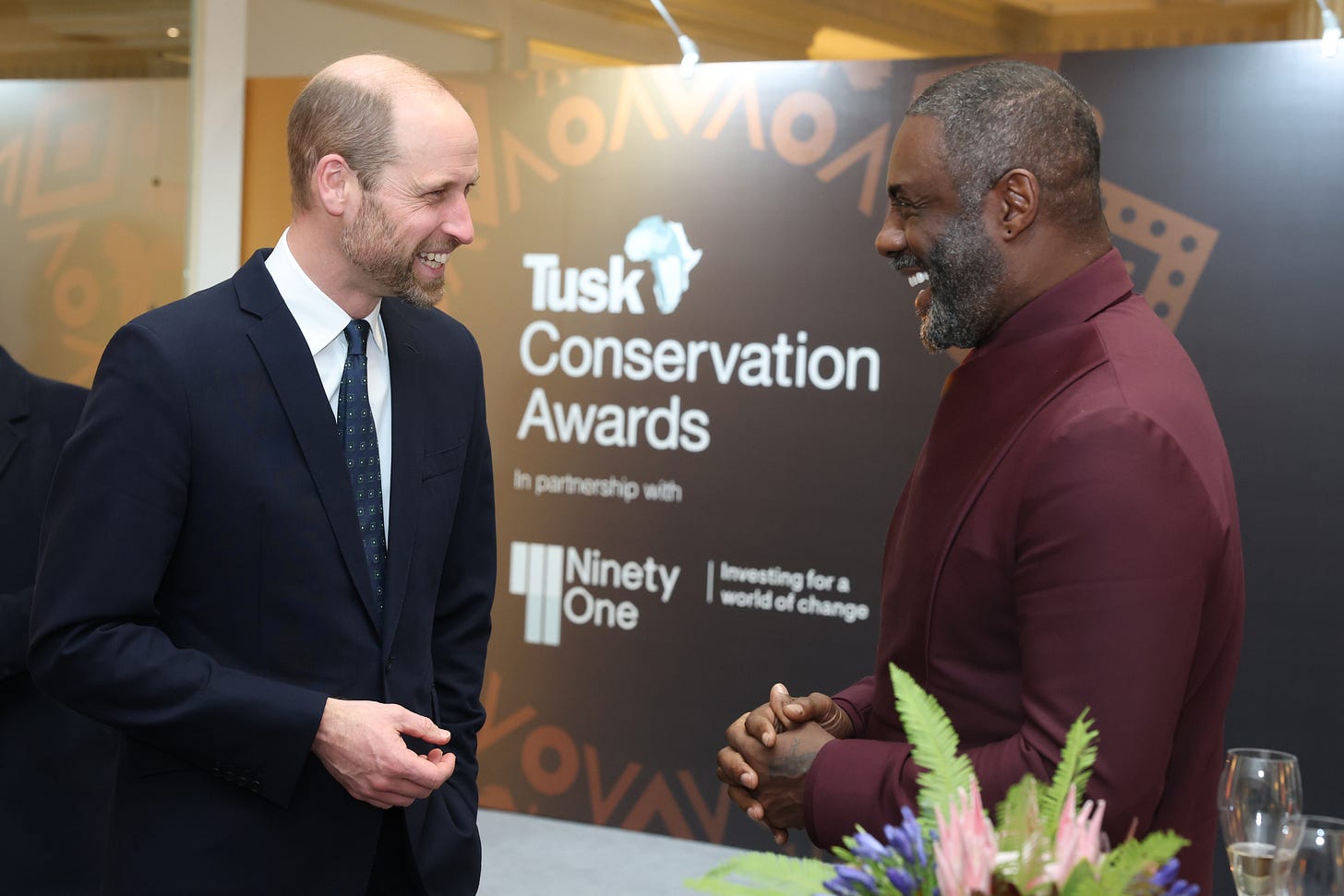 Prince William and Idris Elba laughing