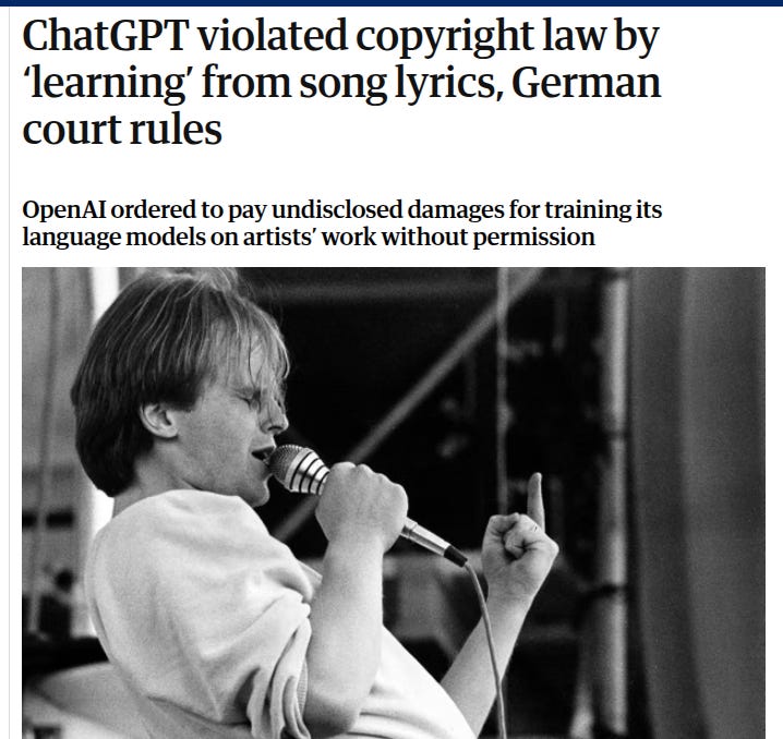 Black and white photograph of a male singer with curly hair performing on stage, holding a microphone close to his mouth while gesturing with his right hand extended, wearing a light-colored jacket over a shirt, standing in front of a microphone stand in a concert setting.