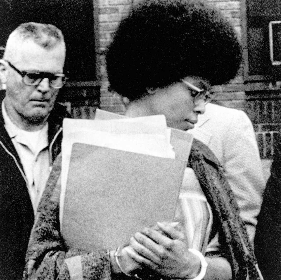 Joanne Chesimard, who used the name Assata Shakur and was a member of the Black Panther Party and Black Liberation Army, leaves Middlesex County courthouse, in New Brunswick, N.J., April 25, 1977. (AP Photo/File)