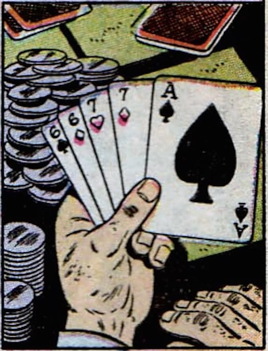 This may contain: a hand holding four playing cards in front of stacks of poker chips and other items