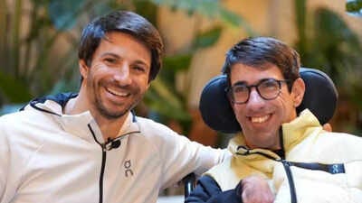 Born with cerebral palsy, he crossed an Ironman finish line with his brother by his side