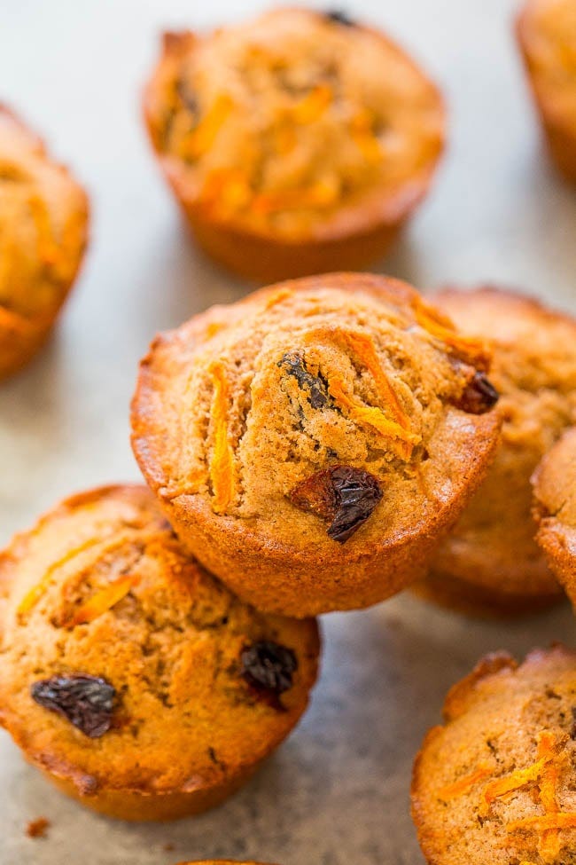 Vegan Carrot Cake Muffins stacked on top of each other. 