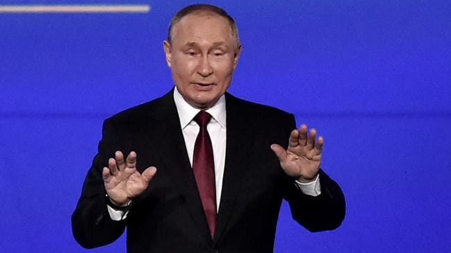Vladimir Putin appears pleased with himself in Saint Petersburg as Western sanctions supercharged Russian oil and gas revenues. Picture: AFP Vladimir Putin appears pleased with himself in Saint Petersburg as Western sanctions supercharged Russian oil and gas revenues. Picture: AFP