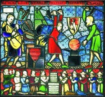 This is the stained-glass window from the Beatrice Webb House in Surrey, England, former headquarters of the Fabian Society. It was designed by George Bernard Shaw and depicts Sidney Webb and Shaw striking the Earth with hammers to "REMOULD IT NEARER TO THE HEART'S DESIRE," a line from Omar Khayyam. Note the wolf in sheep's clothing in the Fabian crest above the globe. This is the stained-glass window from the Beatrice Webb House in Surrey, England, former headquarters of the Fabian Society. It was designed by George Bernard Shaw and depicts Sidney Webb and Shaw striking the Earth with hammers to "REMOULD IT NEARER TO THE HEART'S DESIRE," a line from Omar Khayyam. Note the wolf in sheep's clothing in the Fabian crest above the globe.