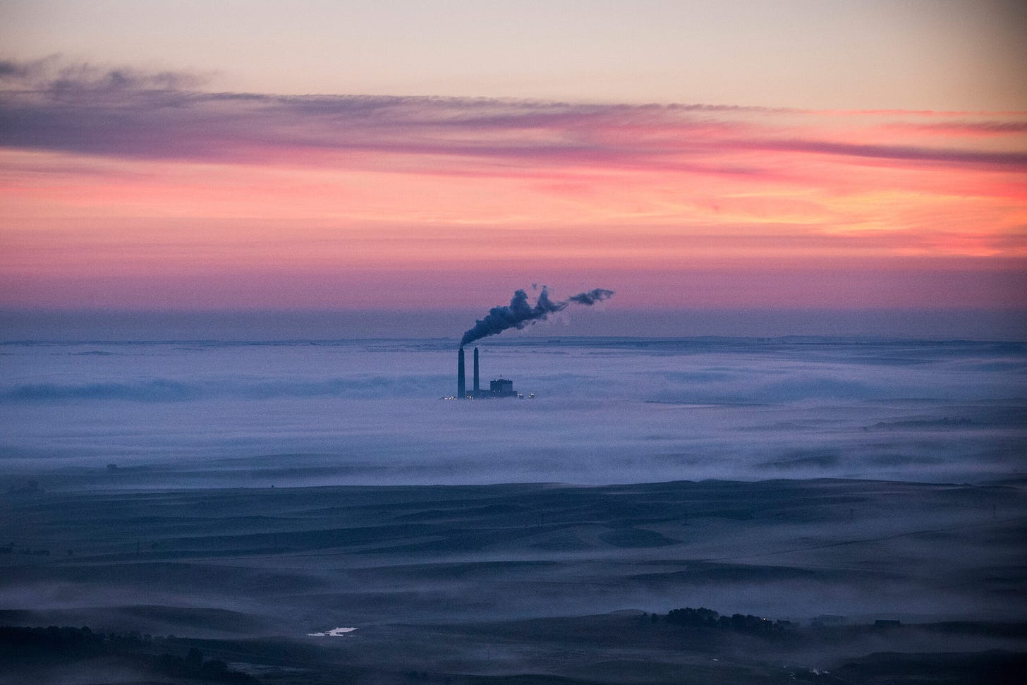 A coal-burning energy plant, as seen through cloud cover near Bismarck, North Dakota. Credit: Andrew Burton/Getty Images. A coal-burning energy plant, as seen through cloud cover near Bismarck, North Dakota. Credit: Andrew Burton/Getty Images.
