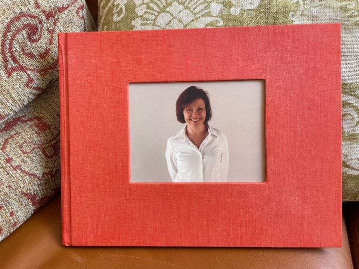A woman (Val Ross) smiles from the cover of a book.