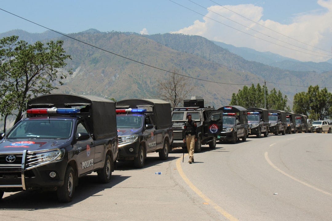 Convoy of vehicles patrolling for security during a shutter-down strike called by the banned Joint Awami Action Committee, in Muzaffarabad