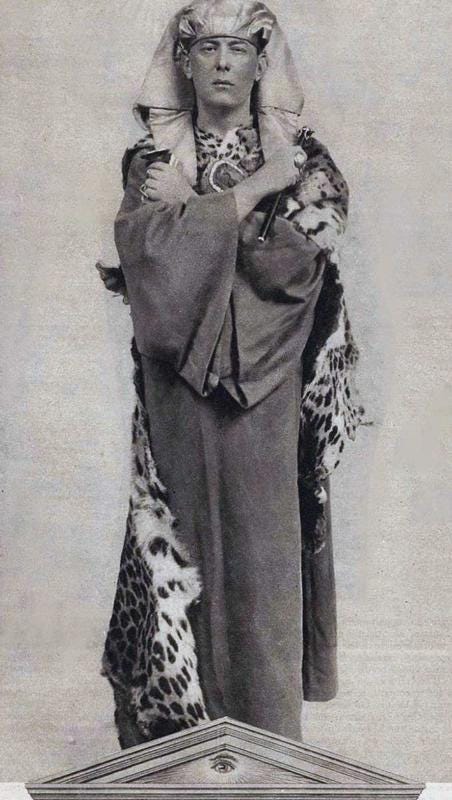 The infamous Aleister Crowley, dressed as Osiris, performing occult rituals for the Hermetic Order of the Golden Dawn secret society, circa 1900.
