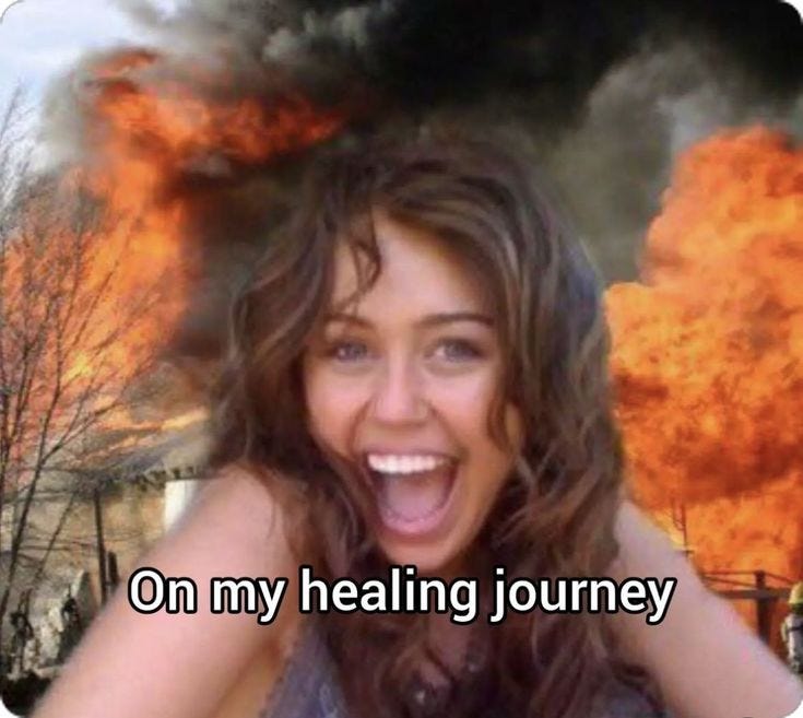 This may contain: a woman with her mouth open in front of a fire that is burning behind her