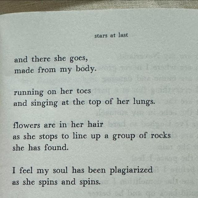 This may contain: an open book with some type of poem on it's page and the words written in cursive writing
