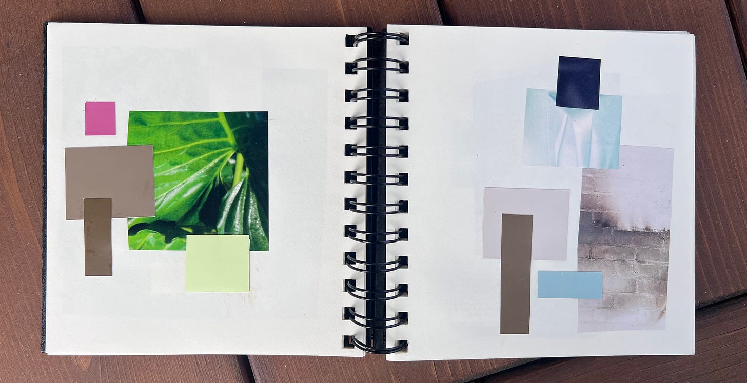 open notebook with colored swatches pasted inside in groups aiming to bevisually appealing